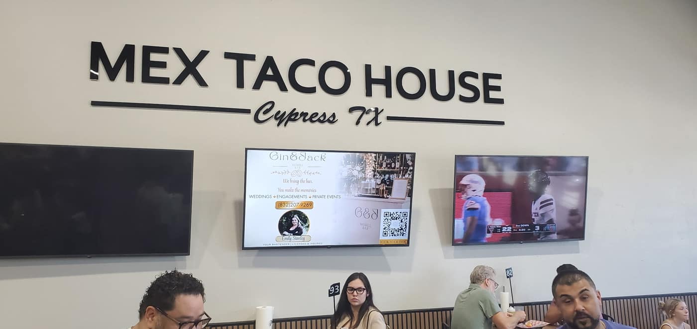 An events venue advertisement playing on a screen at Mex Taco House